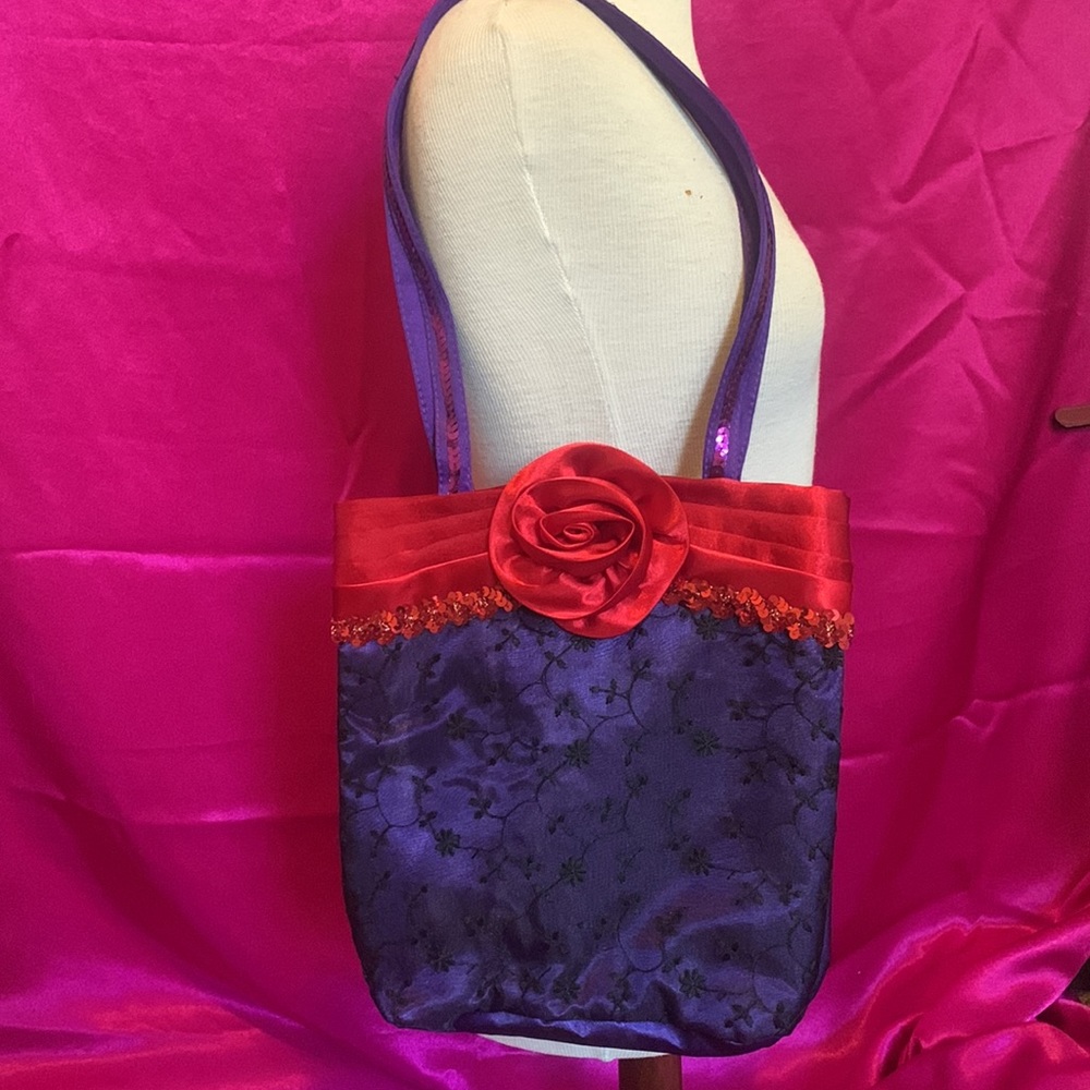 Cute red and purple floral purse with a red rose